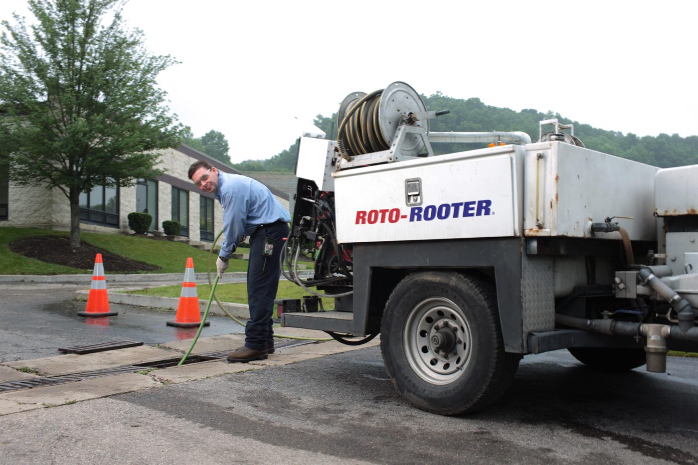 Roto-Rooter hydro jetting truck on a job